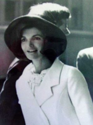 jackie bouvier kennedy in white coat and hat.jpg
